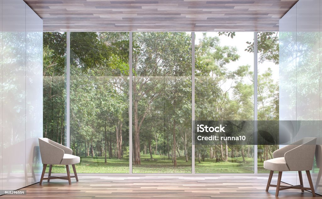 Empty room modern space with nature view 3d rendering image Empty room modern space with nature view 3d rendering image.The room has wooden floor,There are large window overlooking to the nature Window Stock Photo