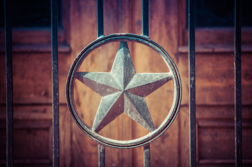 Image of a decorative star with dimension and texture.