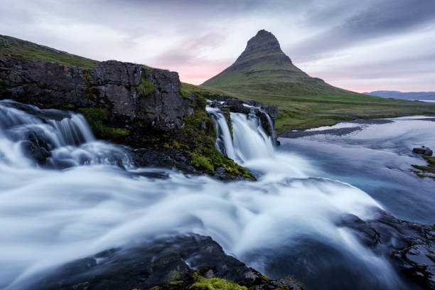 istock Colorful sunrise on Kirkjufellsfoss waterfall 868312946
