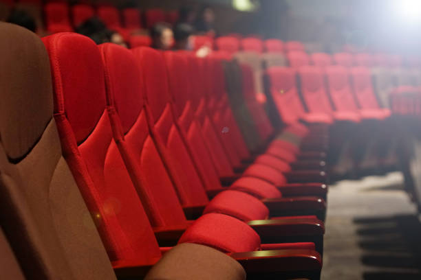 istock Red Velvet Fabric Cloth Empty Many Seats Row 868314198