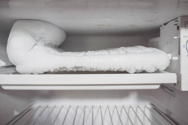 frozen Ice buildup in the freezer of refrigerator frozen Ice buildup in the freezer of refrigerator fridge waterline stock pictures, royalty-free photos & images