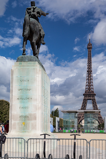Joffre Marshal riding a horse statue and the Eiffel Tower, Paris, France.