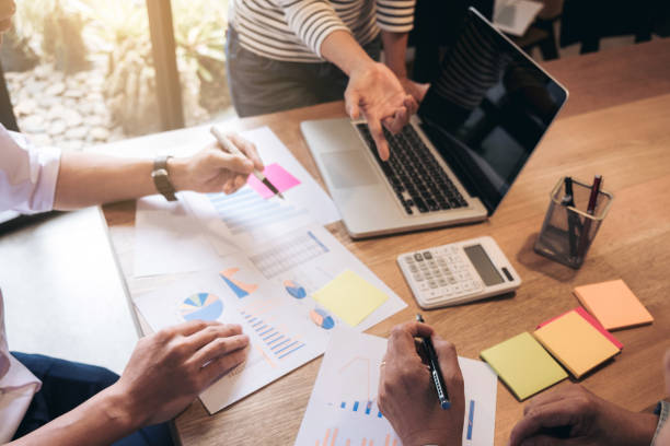 istock Business adviser analyzing financial with new startup finance project plan, co worker team discussing and brainstorming issues to achieve better results, working together, Group of meeting conference 868331998