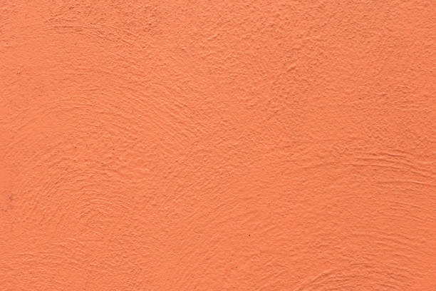 istock Old orange wall background, grunge concrete wall background with natural cement texture. 868334106