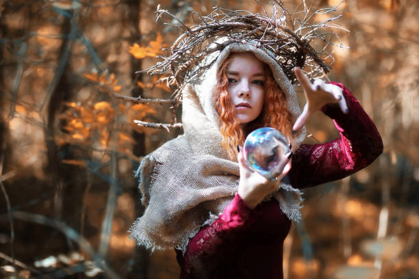 Fortune-teller conducts a ritual in the depths of the forest
