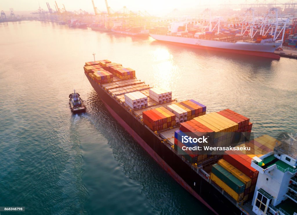 shipyard for Logistic Ship for container with working crane bridge in shipyard for Logistic Import Export background Ship Stock Photo