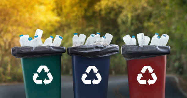 istock man hand putting plastic reuse  for recycling concept environmental protection world recycle 868349210