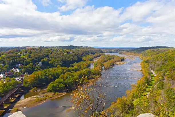 Photo of Aerial view on a trail along Potomac River and buildings near Harpers Ferry railway station.