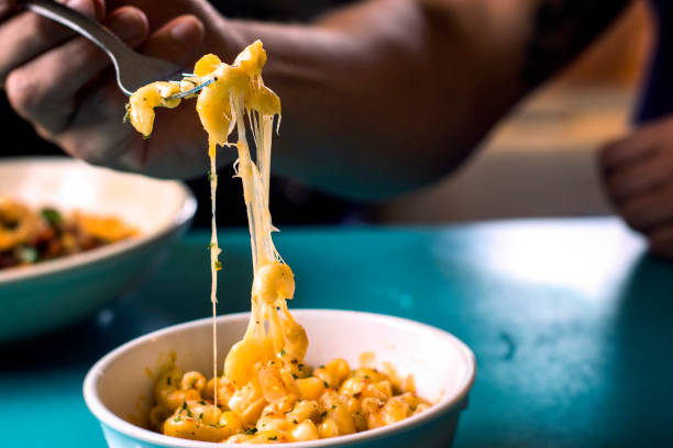 Eating a bowl of Macaroni and Cheese