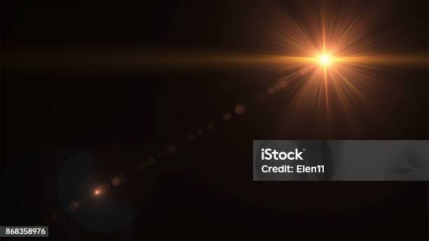 Abstract Sun Burst With Digital Lens Flare On The Black Background Stock Photo - Download Image Now