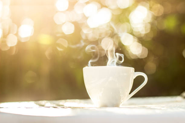 istock A white of coffee on white table in the garden 868369450