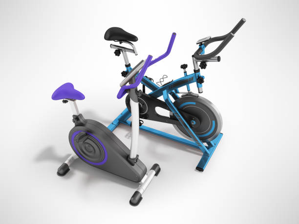 istock Two modern sport exercise bikes blue and violet perspective front 3d render on gray background 868377438