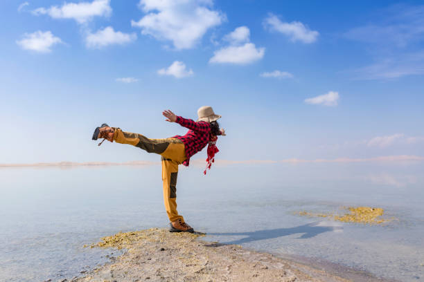 istock The tourists standing beside the lake 868380664