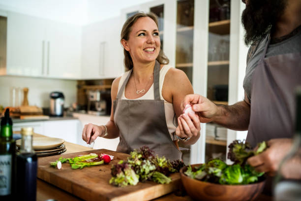 istock A couple is cooking in the kitchen together 868382148