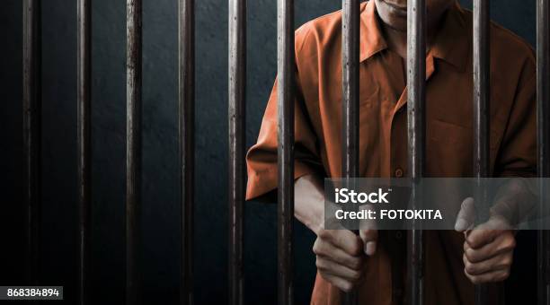 Man In Prison Stock Photo - Download Image Now - Prison, Prisoner, Criminal