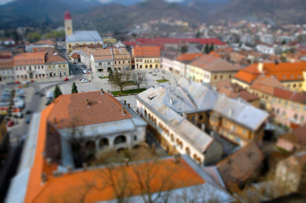 European medieval city view. Miniature tilt shift lens effect. Baia Mare, Romania