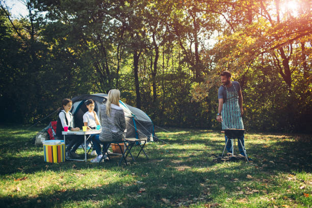 istock Family camping together 868389198