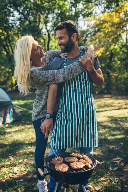 istock Man and woman camping together 868389766