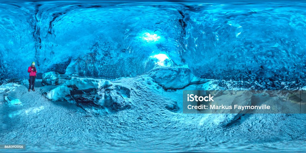 Panorama of ice cave in iceland Equirectangular panorama of the inside of an ice glacier cave in Iceland Ice Cave Stock Photo