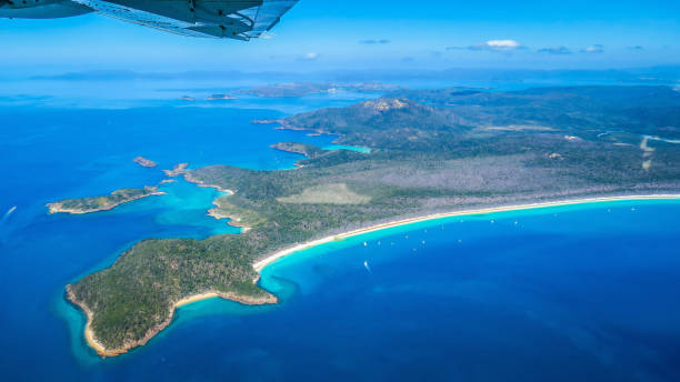 istock Exploring the Great Barrier Reef from the air in Australia 868392356