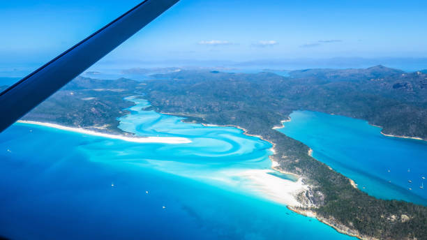 istock Exploring the Great Barrier Reef from the air in Australia 868392492