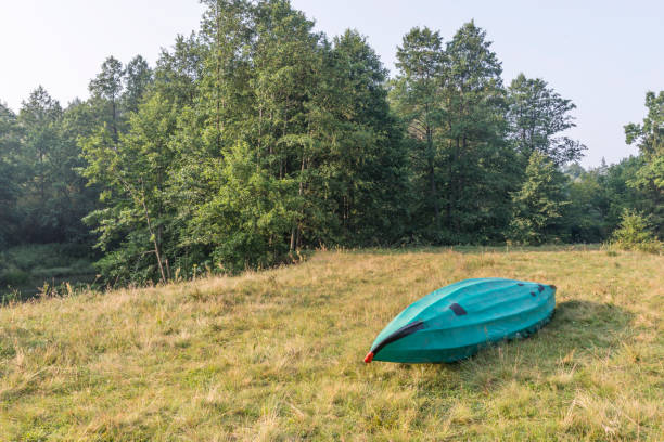 istock tourist canoe on field 868393092