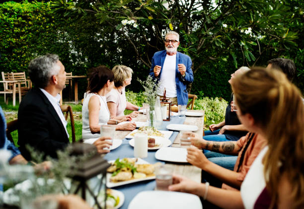 istock Group of diverse friends are having a dinner together 868396264