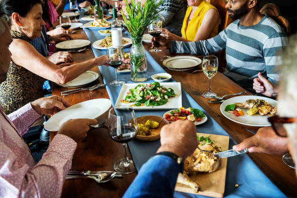 Group of diverse friends are having a dinner together