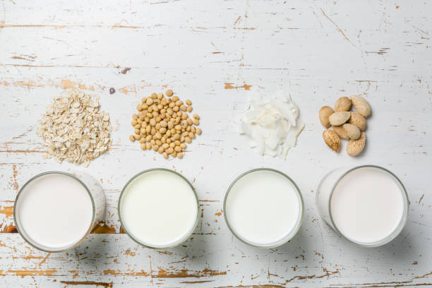 concepto de leche no lácteos - soybean merchandise soy milk milk fotografías e imágenes de stock