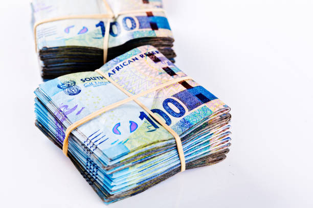 istock Two folded bundles of South African Hundred Rand banknotes 868405418