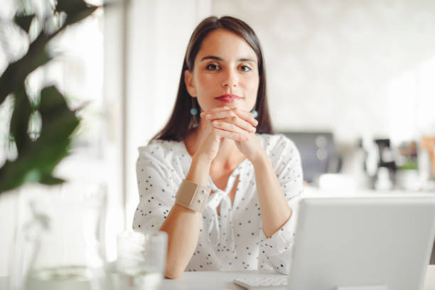 istock Young woman working in her offfice 868408666