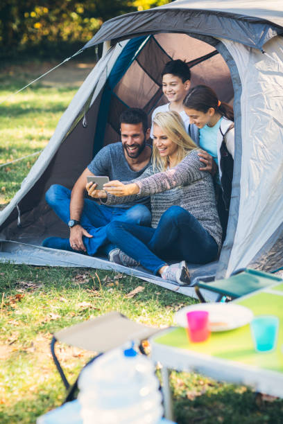 istock Family camping together 868408864