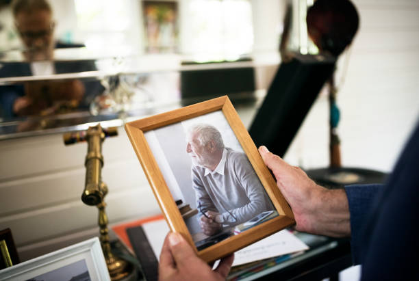 istock Closeup of hands holding photo frame 868409216