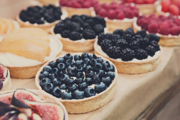 istock Closeup of fig tart dessert tray assorted 868409280