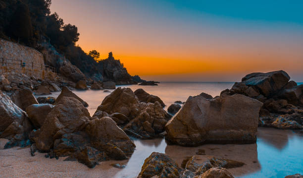 istock Dawn on the beach on the Costa Brava in Catalonia, Spain 868421884