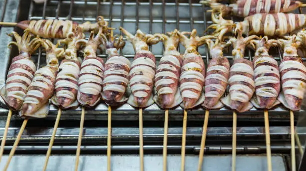 Fresh grill squid on street food Thailand
