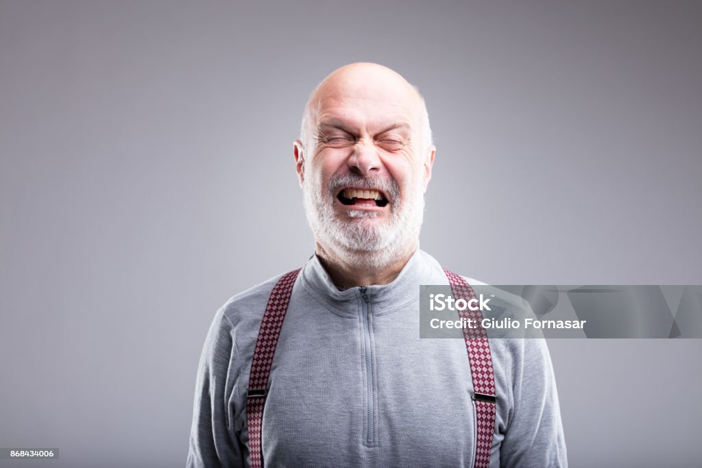 exaggerated tearing old man expression teatrical exaggerated expression of an old man crying Men Stock Photo