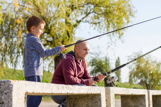 istock Father and son fishing 868439540