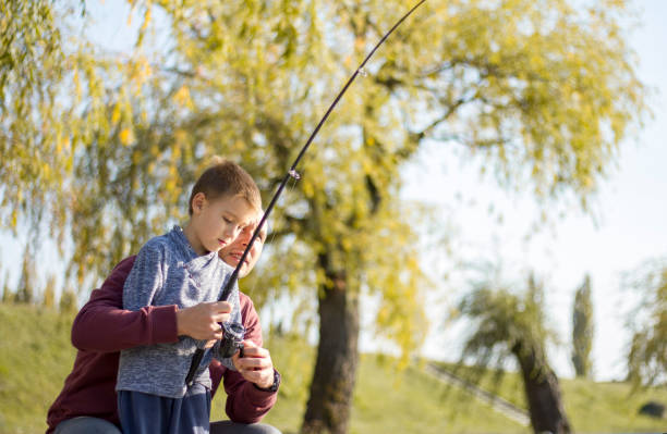 istock Father and son fishing 868442690
