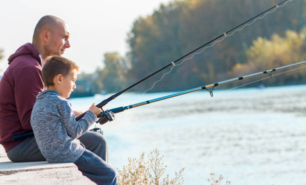 istock Father and son fishing 868446168