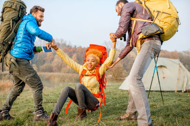 istock Hikers with backpacks outdoors 868447370
