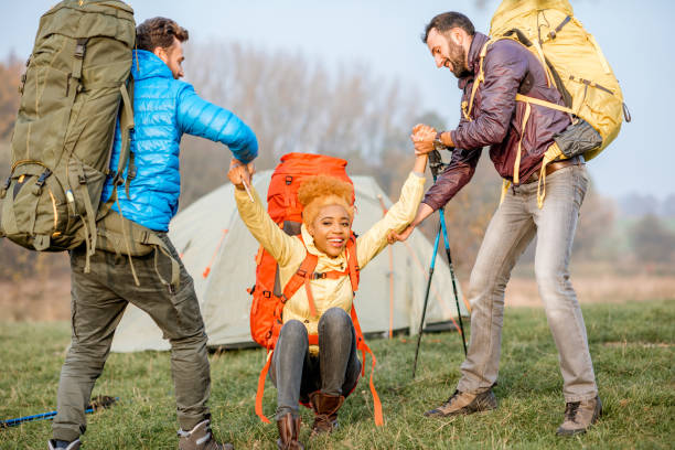 istock Hikers with backpacks outdoors 868447424
