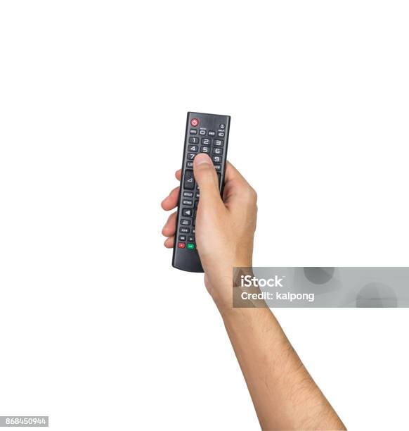 Remote Tv Controller Hand Holding Isolated On White Background Clipping Path Stock Photo - Download Image Now