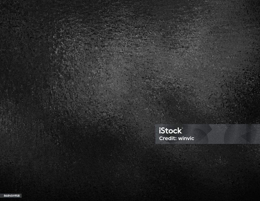Black foil textured background. Dark elegant smooth metallic texture. Dark shiny metallic texture, black foil background. Black Color Stock Photo