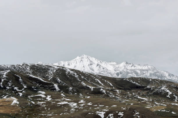 istock snow mountain with grassland in winter 868455334
