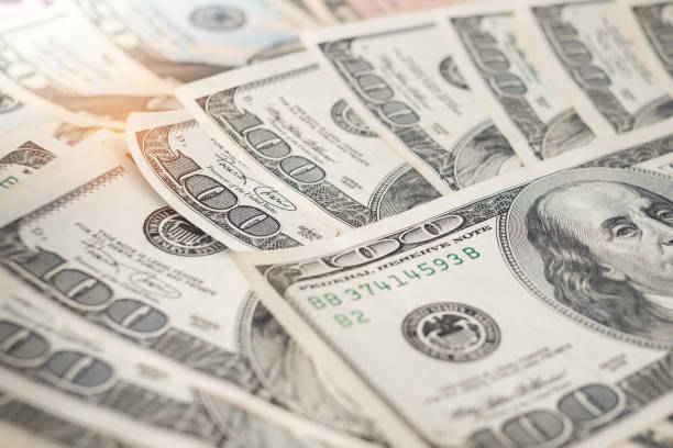 istock Close up heap of one hundred dollars 868455370