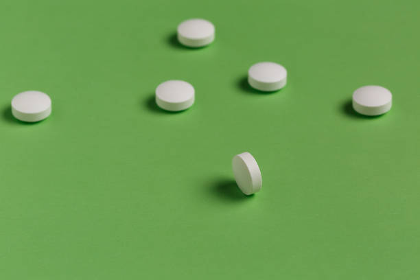 istock White round medicine pills 868465958