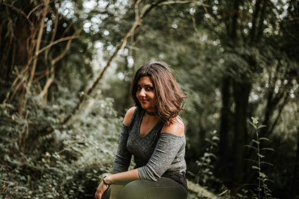 istock Young woman at forest 868468892