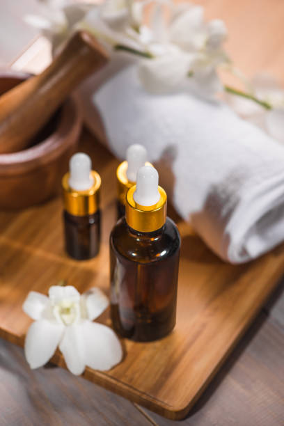 istock Spa still life with towel, white orchid, bath oil 868473252