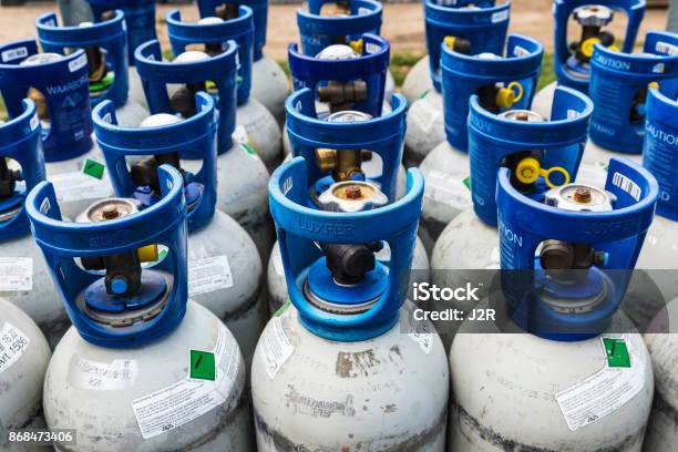 Refrigerant Gas Cylinders Under Pressure Ready To Transport Stock Photo - Download Image Now